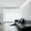 Monochrome living room in a transformed 99 sqm apartment in Weihai