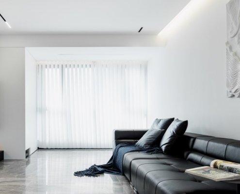 Monochrome living room in a transformed 99 sqm apartment in Weihai