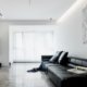 Monochrome living room in a transformed 99 sqm apartment in Weihai