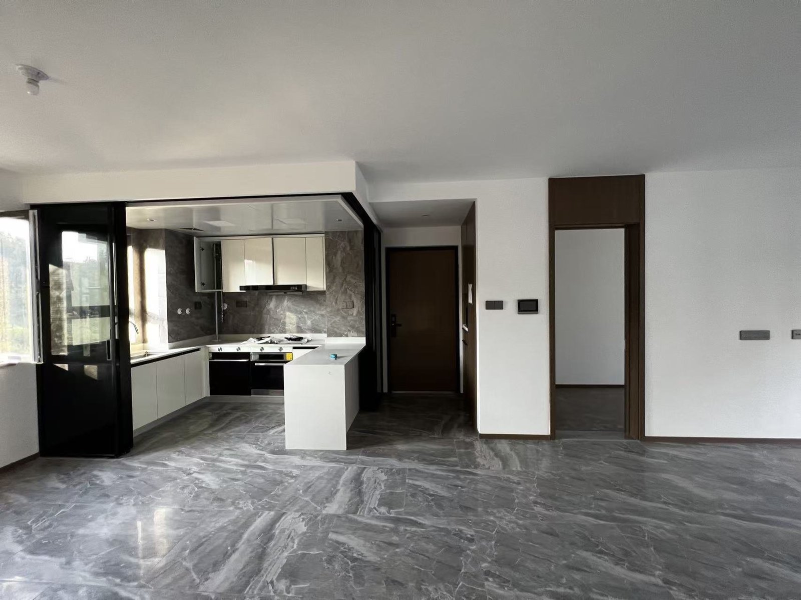 Original living, dining and kitchen area before renovation