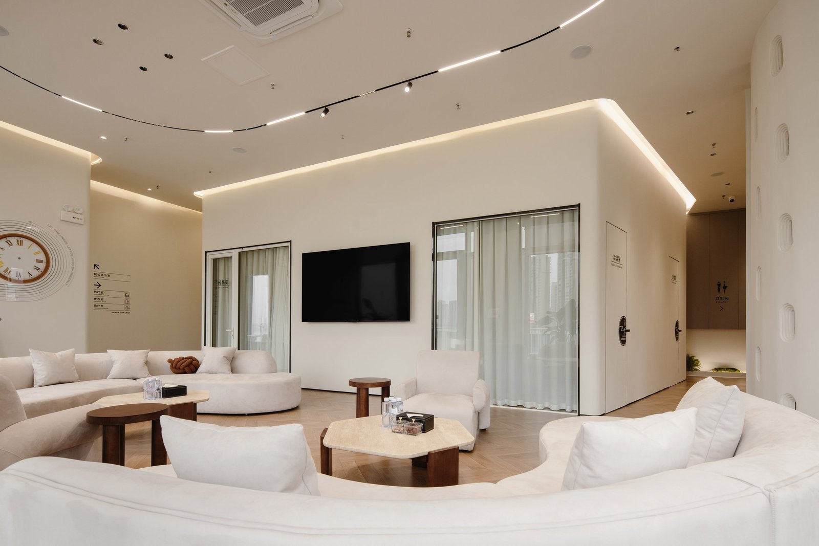 Open waiting area arranged as a series of relaxed seating zones
